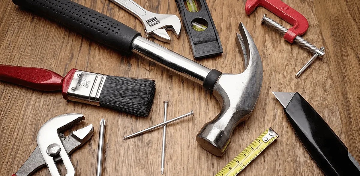 Handyman tools laid out for home repair and maintenance work in Kansas City, KS